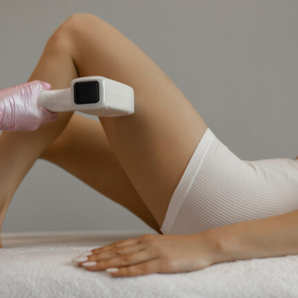 Closeup of unrecognizable woman posing against a white studio background. One female only feeling c.