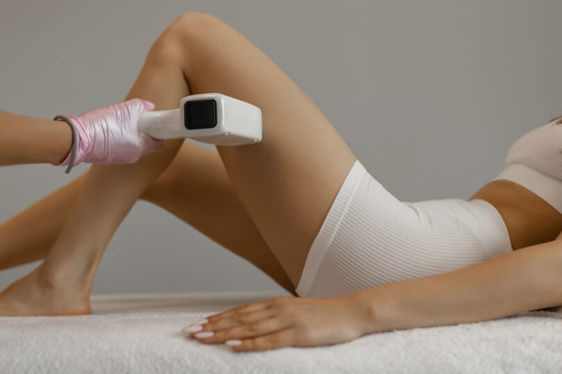 Closeup of unrecognizable woman posing against a white studio background. One female only feeling c.