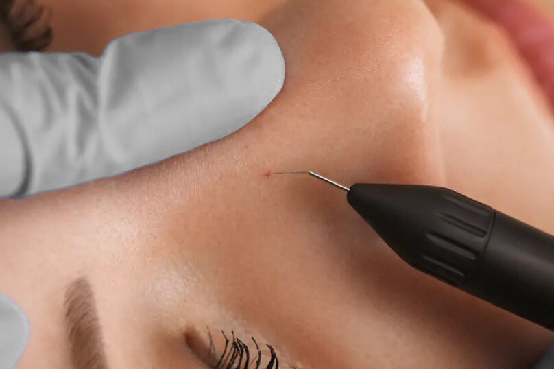 Closeup of unrecognizable woman posing against a white studio background. One female only feeling c.