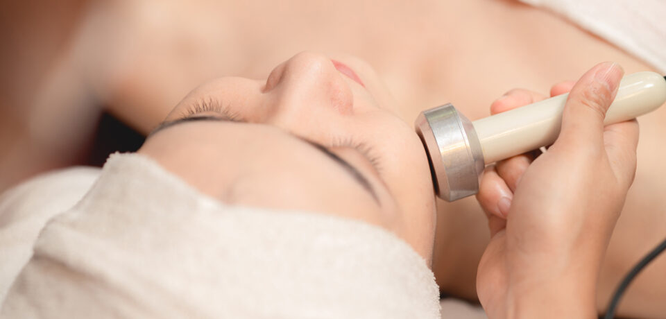 Closeup of unrecognizable woman posing against a white studio background. One female only feeling c.