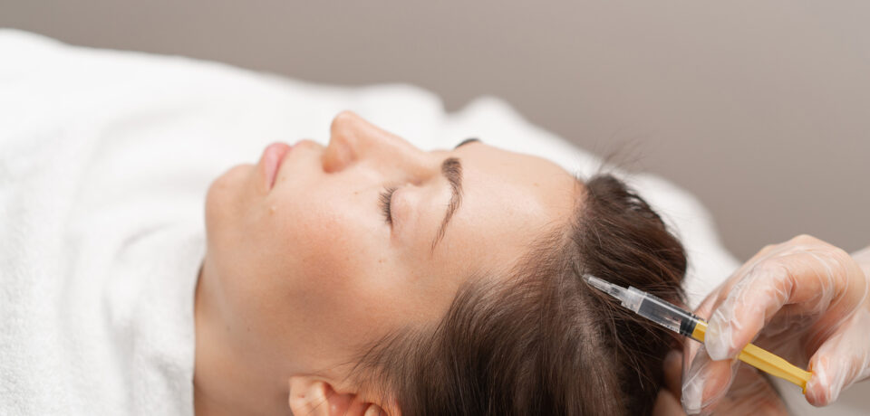 Closeup of unrecognizable woman posing against a white studio background. One female only feeling c.