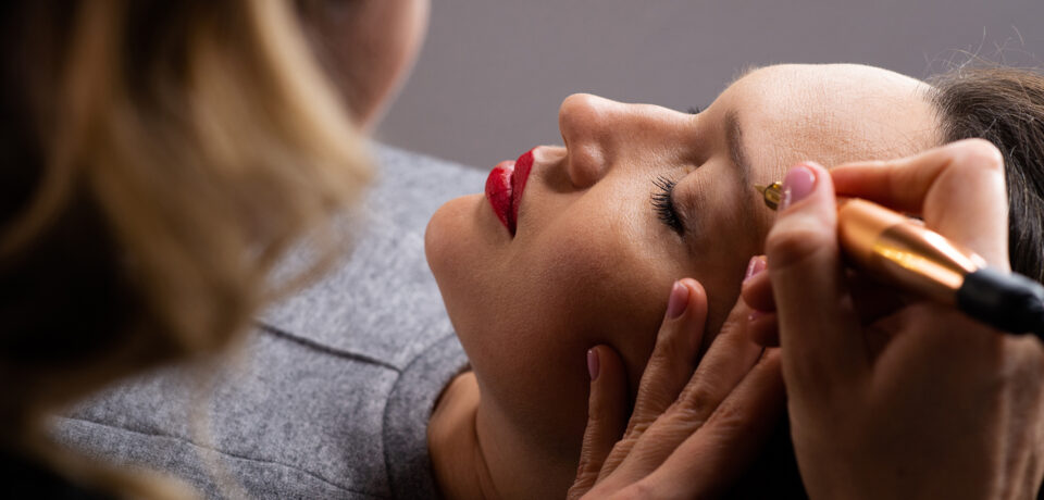 Closeup of unrecognizable woman posing against a white studio background. One female only feeling c.