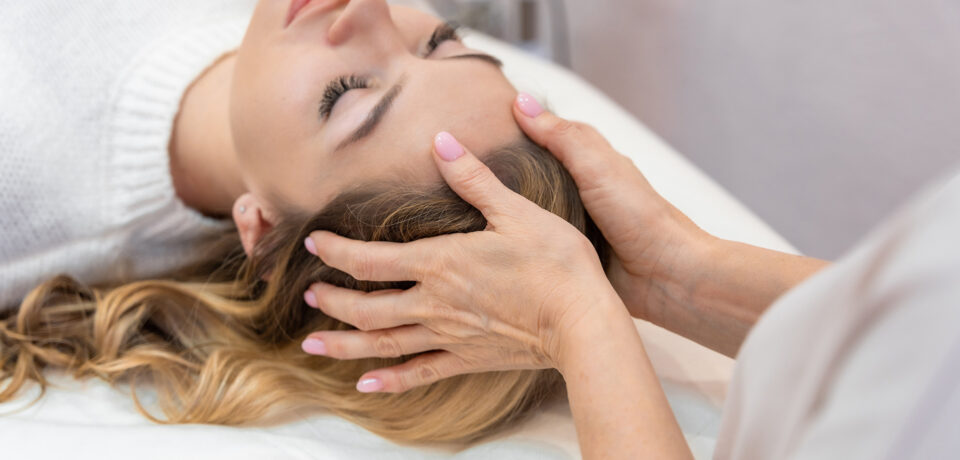 Closeup of unrecognizable woman posing against a white studio background. One female only feeling c.