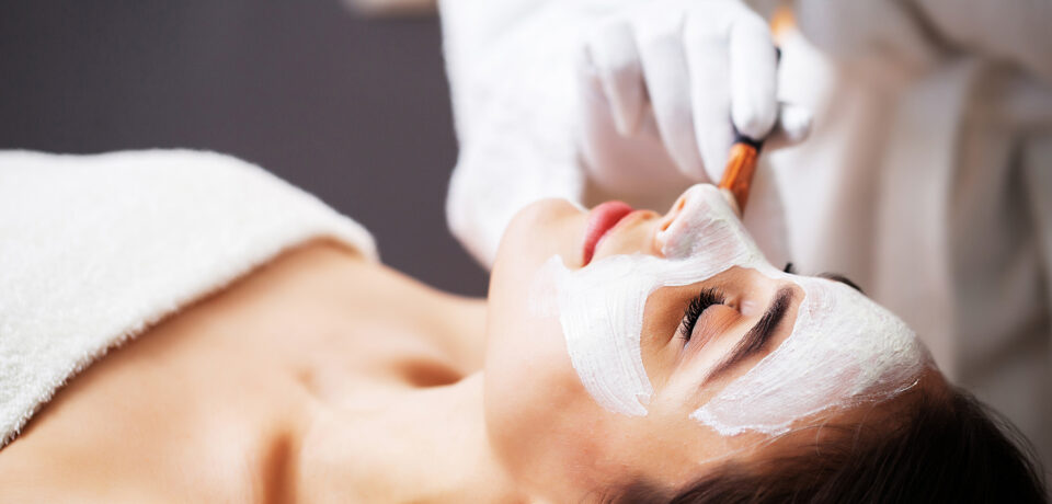 Closeup of unrecognizable woman posing against a white studio background. One female only feeling c.