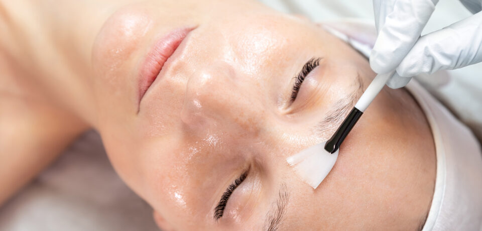 Closeup of unrecognizable woman posing against a white studio background. One female only feeling c.